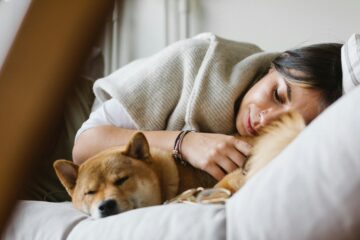 Why does my dog sleep against me? The untold secret